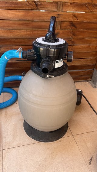 Piscina con depuradora de arena