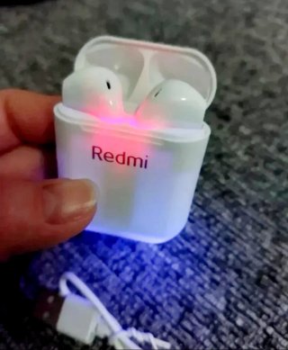 Auriculares Bluetooth Blancos.