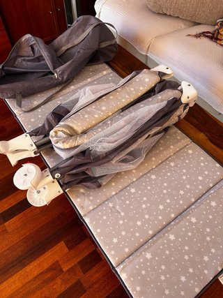 Cuna de viaje estrellas
