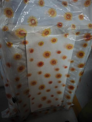 Cambiador de pañales con diseño de girasoles