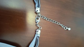 Collar multicapa gris y plateado