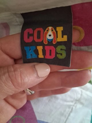 Colcha infantil con corazones y conejos