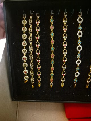 Lote pulseras collares y conjuntos dorados acero