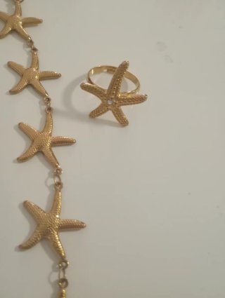 Conjunto collar y anillo estrellas doradas