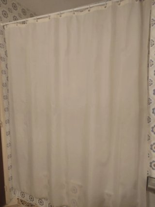 Cortina y barra de baño