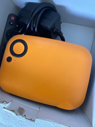 Proyector Cine Mini Naranja y Negro