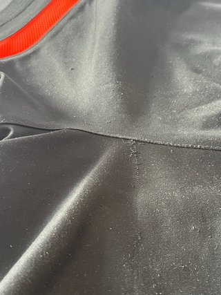 Pantalón corto Nike negro y naranja