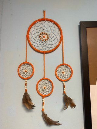 Cazador de sueños naranja