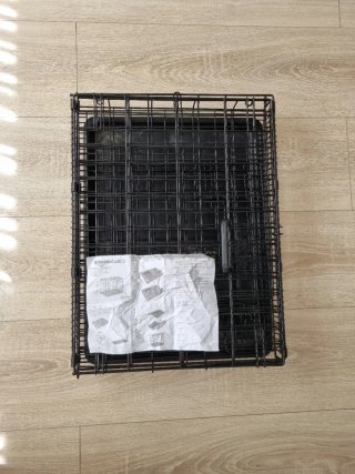 Jaula portátil para mascotas negra