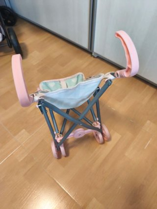 Silleta de paseo para muñecas