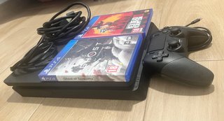 PS4 Slim 1TB + Mando + 2 Juegos