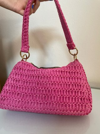 Bolso rosa y dorado con tejido