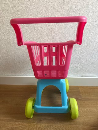 Carro de compra de juguete rosa y azul