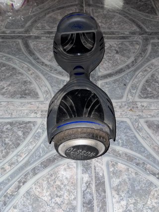 Patin electrico gris con luces azules