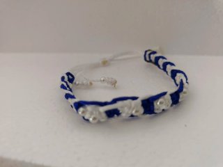 Pulsera artesanal con cuentas y colgante