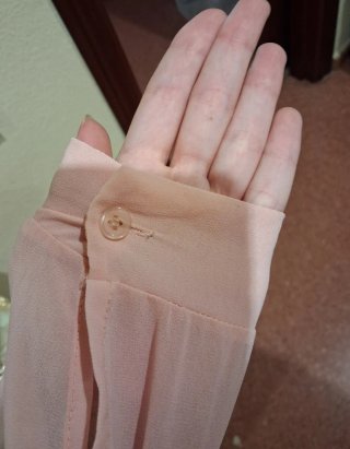Body rosa de manga larga de tela fina