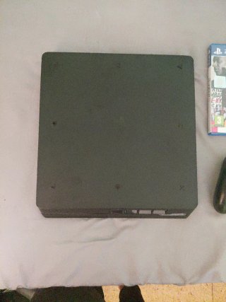 Ps4 Slim 1TB Sony Negra con FIFA 21 y FIFA 23