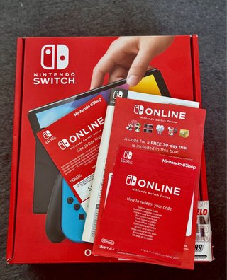 Nintendo Switch OLED + 2 juegos