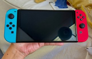 Nintendo Switch OLED + 2 juegos