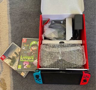 Nintendo Switch OLED + 2 juegos