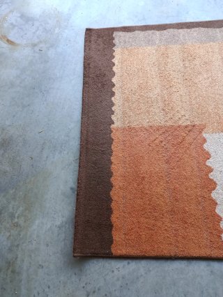 Alfombra de tela tonos marrones y beige 190*130