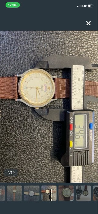 Reloj Seiko Quartz Dorado y Marrón