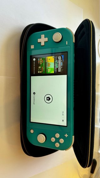 Nintendo Switch Lite Turchese + custodia e astuccio