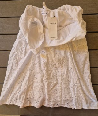 Abito estivo bianco con pizzo