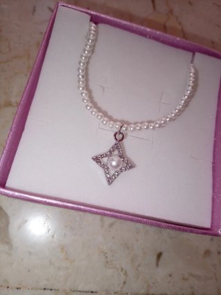 Collana perle bianche con pendente stella