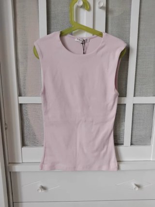 Camiseta sin mangas rosa bebé stradivarius
