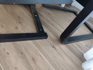 Sillón IKEA POÄNG con reposapiés marrón