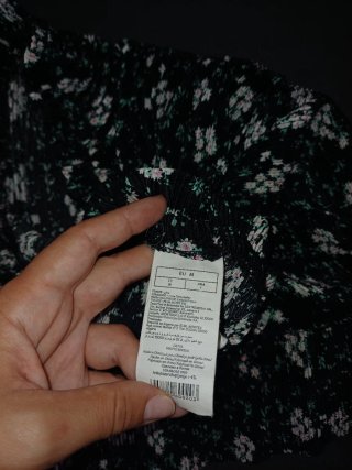 Falda negra floral Pimkie