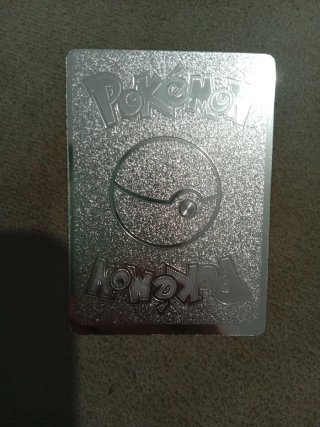 Carta Pokémon plateada Charizard GX Evolución