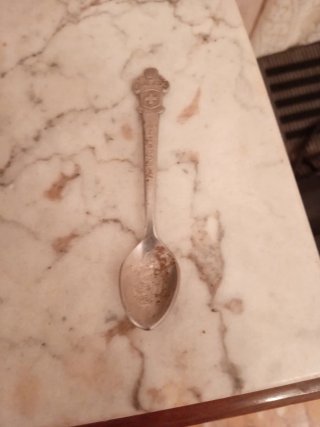 Cuchara de café Rolex de metal plateado