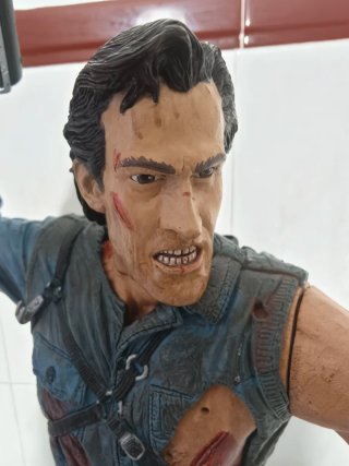 Figura Ash