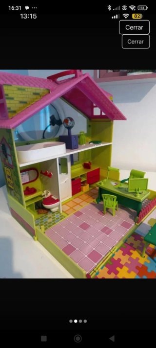 Casita de juguete con jardín