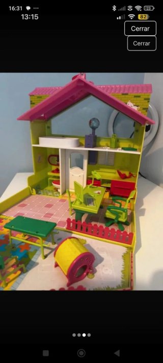 Casita de juguete con jardín