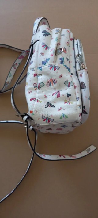 Mochila Parfois pequeña con estampado de mariposas