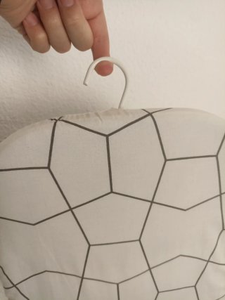 Tabla de planchar con funda geométrica