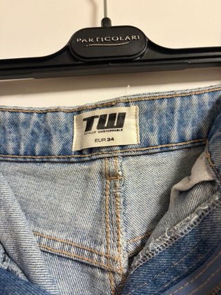 Coppia shorts jeans strappati