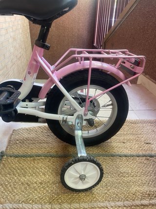 Bici niña rosa con ruedines