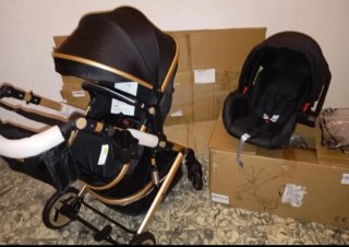 Carrito de bebé y silla coche negro