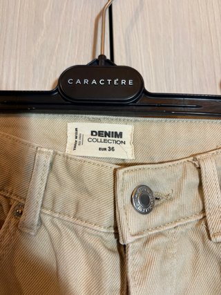 Pantaloni cargo beige strappati