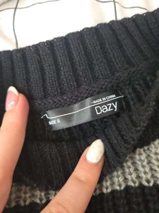 Jersey de rayas negro y gris