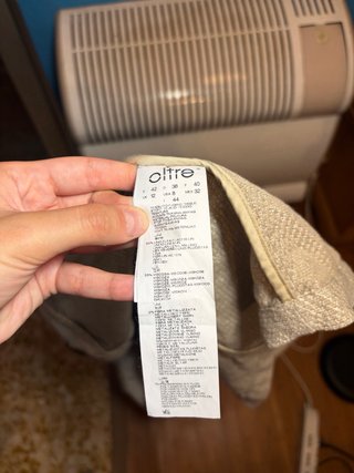 Giacca beige con dettagli marroni