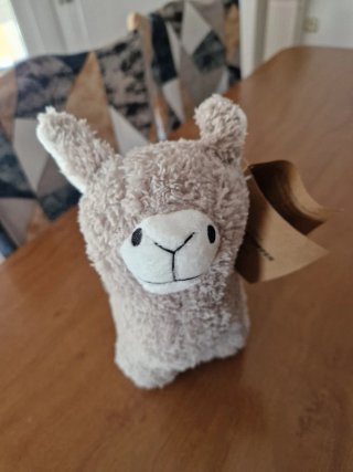 Tope de puerta de peluche de llama