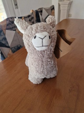Tope de puerta de peluche de llama