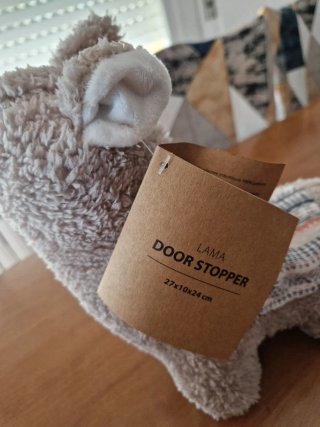 Tope de puerta de peluche de llama