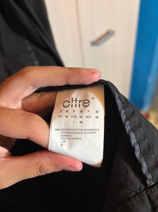 Soprabito Oltre nero lungo bottoni