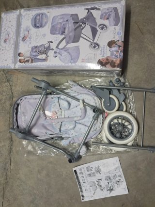 Carrito de juguete para muñecas